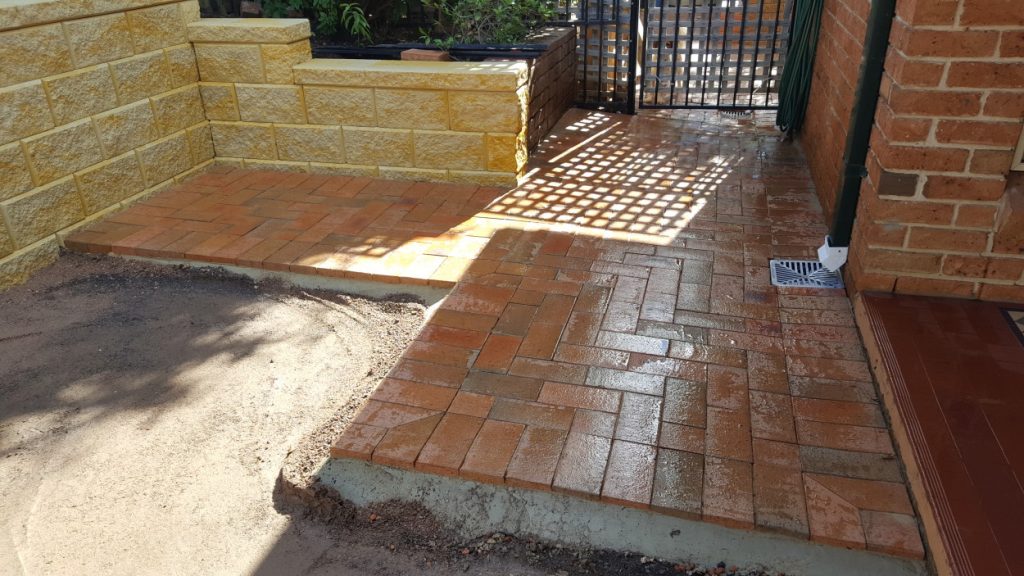 outdoor retaining wall and pavers